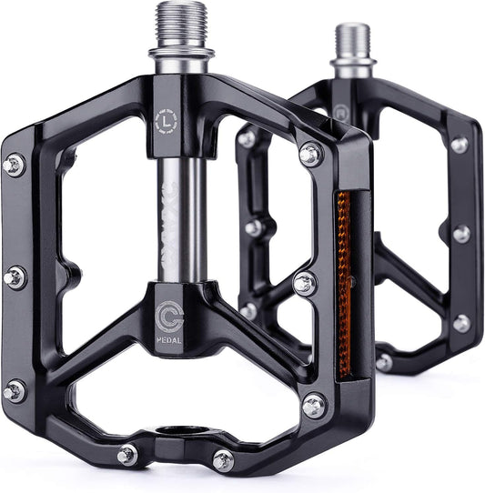 Black alloy eBike pedals with built-in reflectors, product image on white background