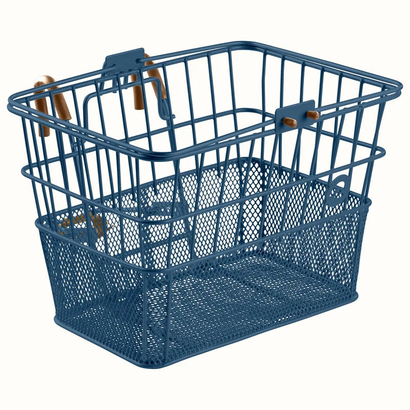Navy blue Retrospec Apollo steel bike basket attached to the front of an eBike, product image.