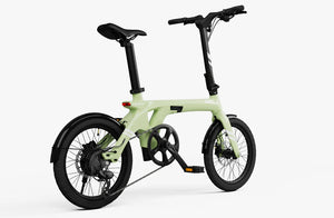 Lime green Urtopia Carbon Fold 1 eBike, side view, folded for compact storage, against a plain background.