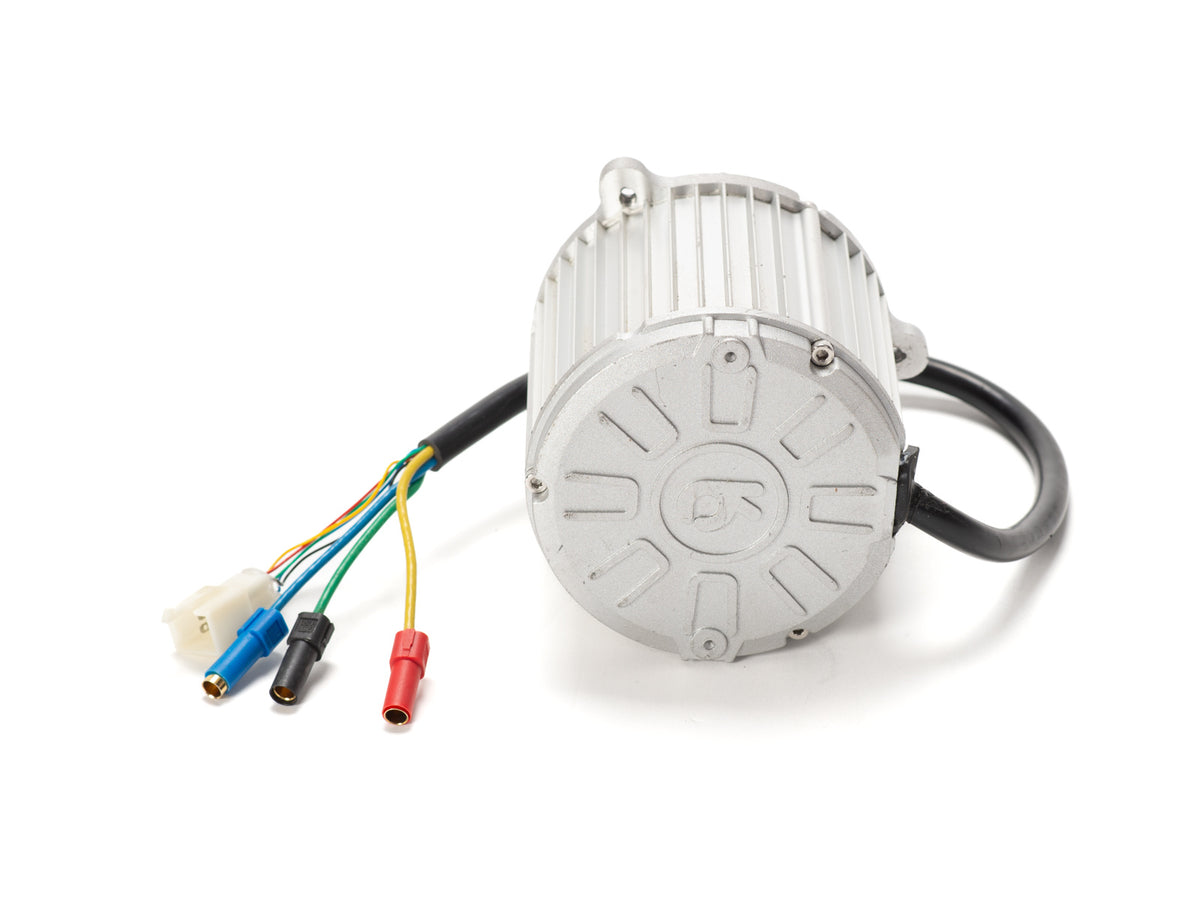 Stomp Ebox 60V electric dirt bike side view showcasing motor, frame, and suspension components
