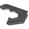 Stomp Ebox chain guard, black metal component with mounting holes, displayed on a white background.