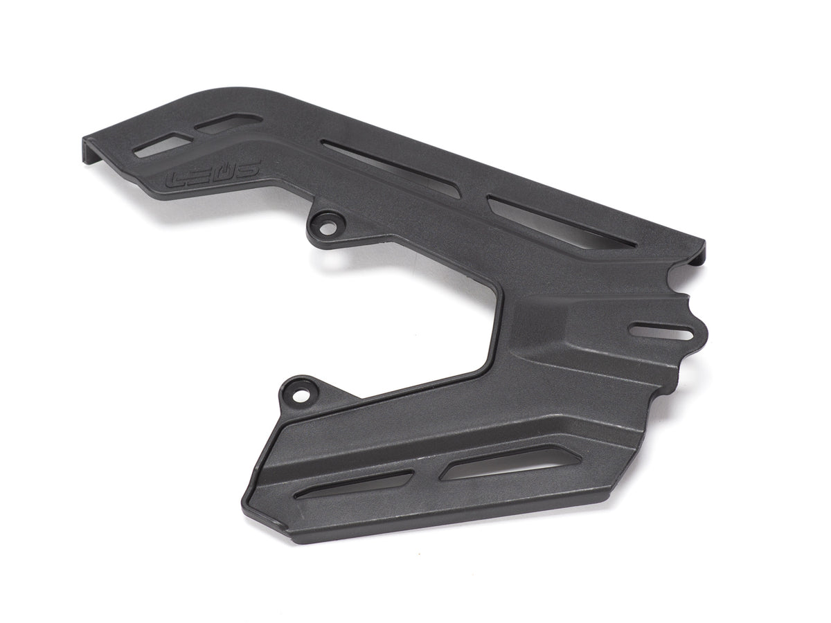 Stomp Ebox chain guard, black metal component with mounting holes, displayed on a white background.
