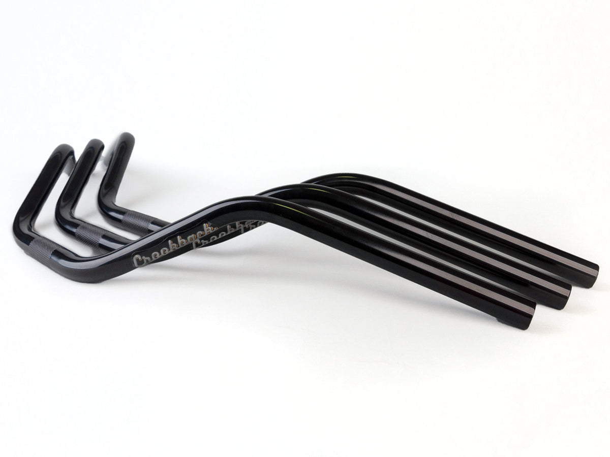 Stomp Ebox Crookback Cruiser Bars, black handlebar with ergonomic crookback design, shown against a white background.