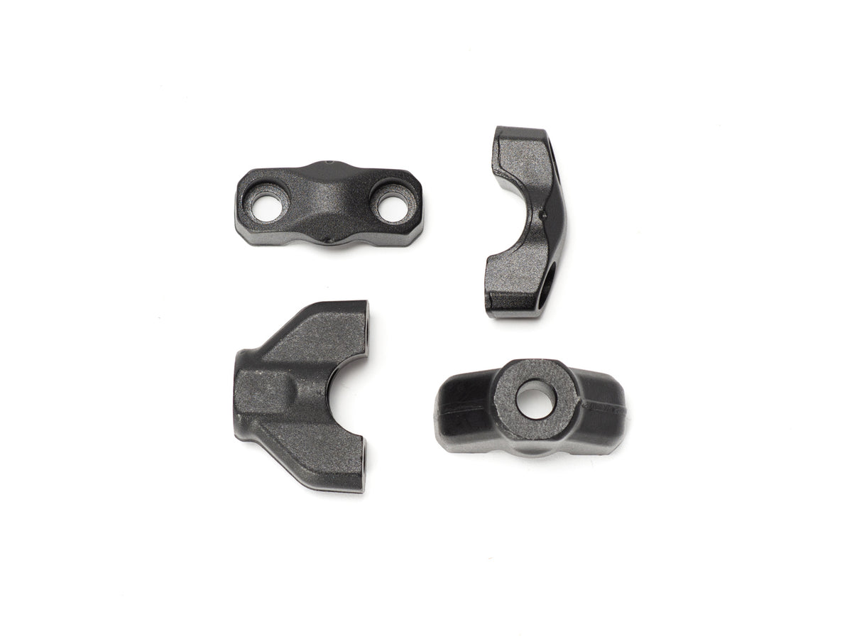 Close-up view of the Stomp Ebox Dragster Bar Riser, showing its black anodized finish, sturdy construction, and mounting hardware.