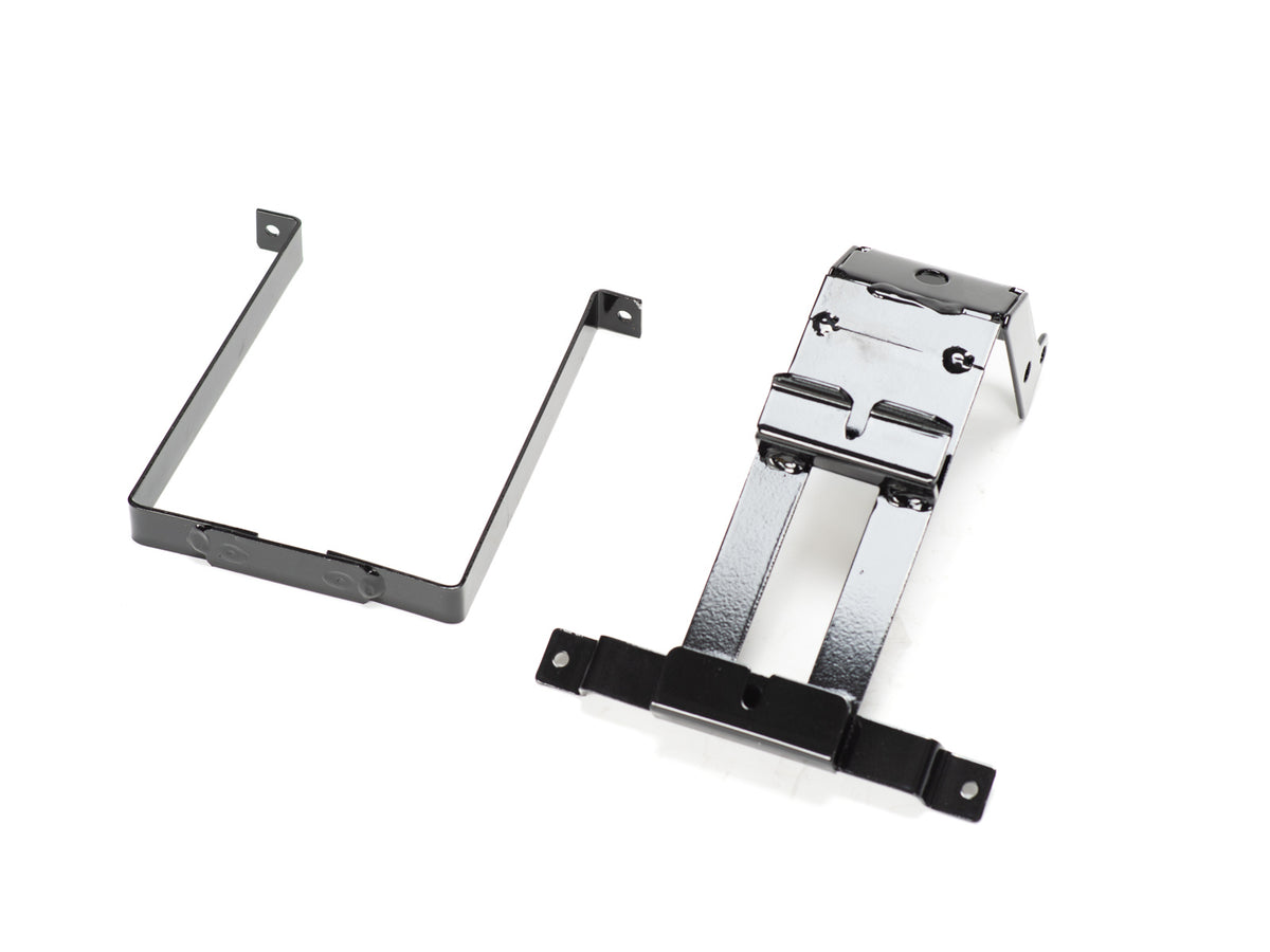 Stomp Ebox Dragster battery cradle shown from a side angle, highlighting its metal frame and mounting points.
