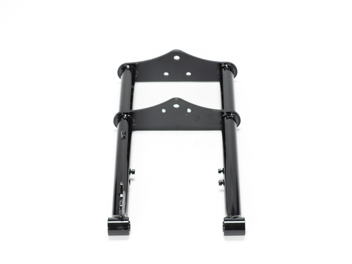 Stomp Ebox Dragster Forks, front view showing silver suspension forks with black mounting brackets and axle clamps, displayed against a white background.