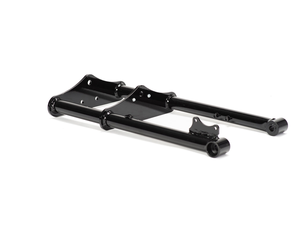 Close-up view of Stomp Ebox Dragster motorcycle forks, showing the suspension components and metallic finish.