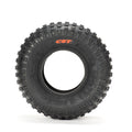 Stomp Ebox Dragster off-road tire, black rubber with deep tread pattern, side view on white background