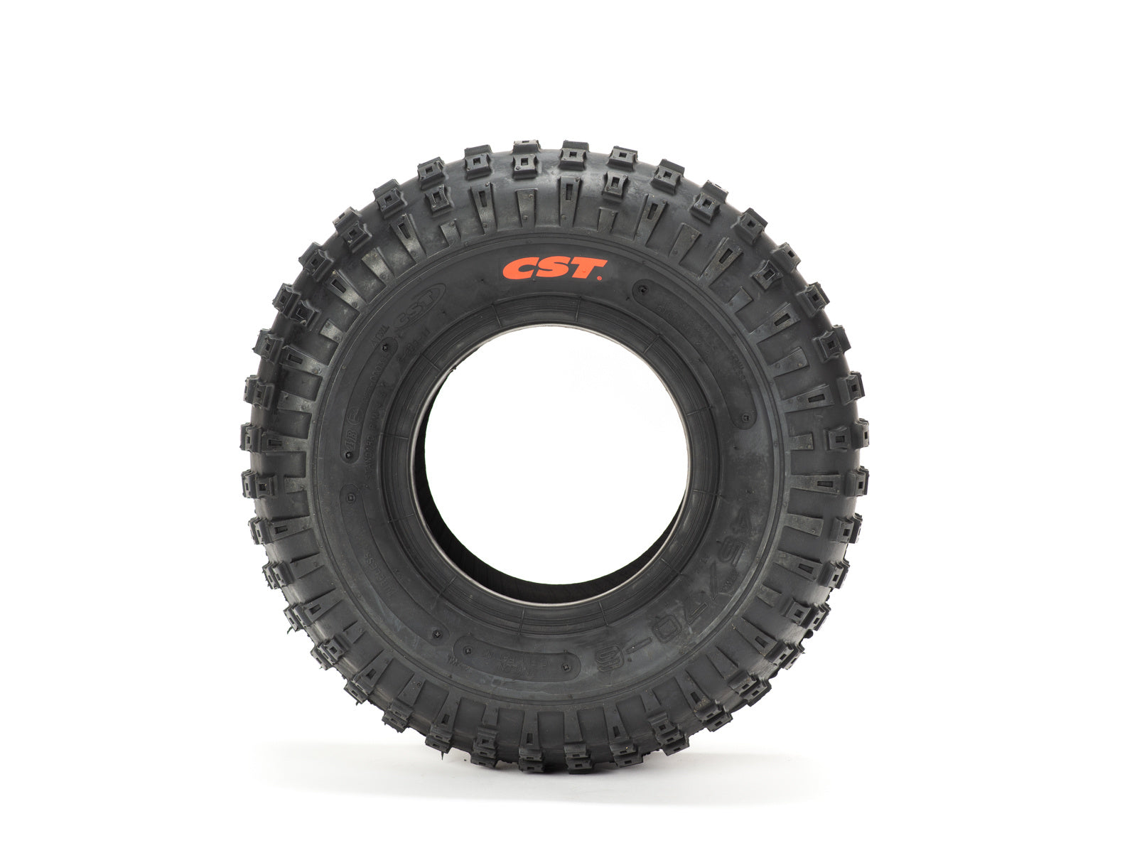 Stomp Ebox Dragster off-road tire, black rubber with deep tread pattern, side view on white background