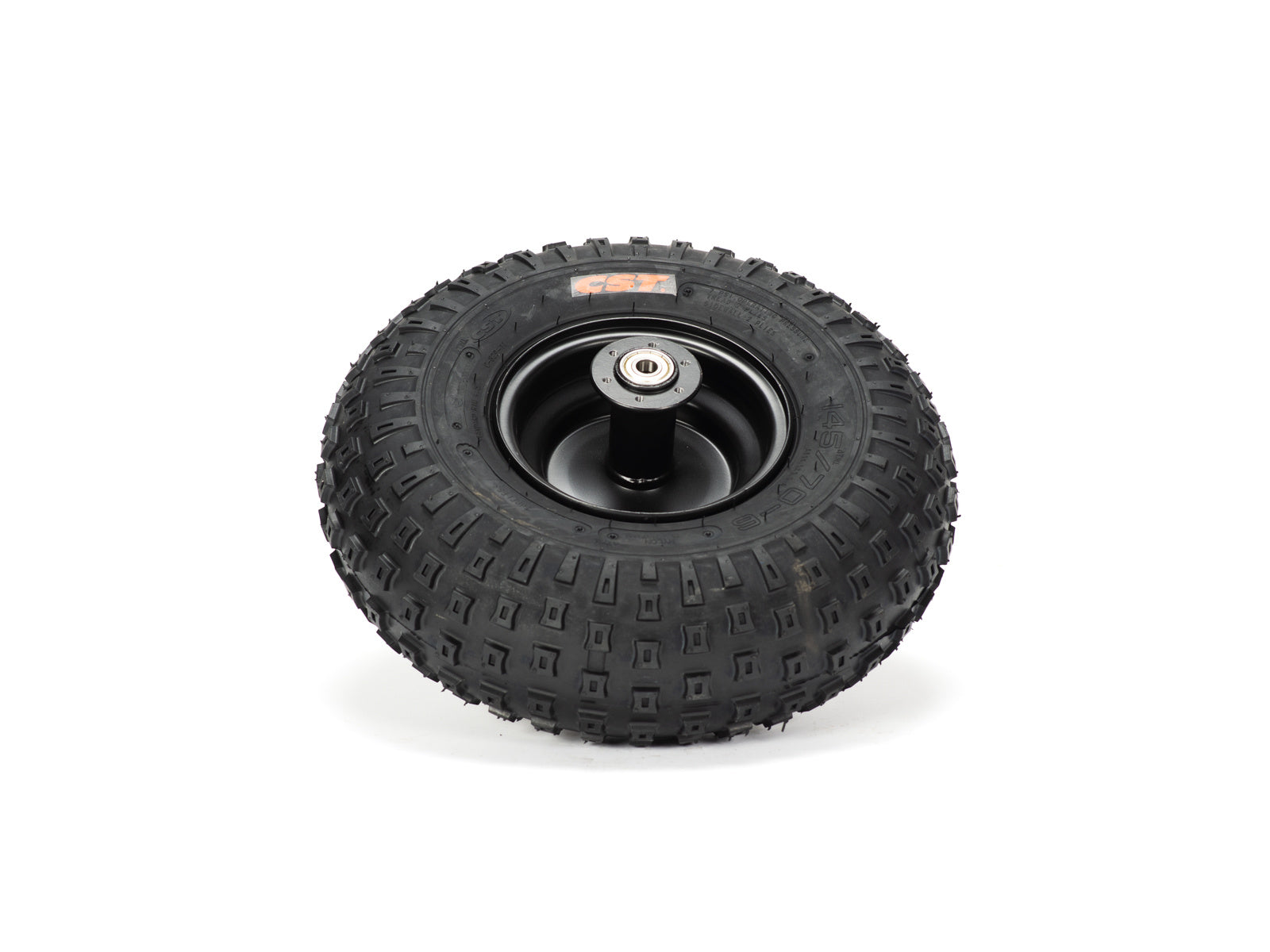 Stomp Ebox Dragster rear wheel with mounted tire, side view, showing tread pattern and alloy rim design.