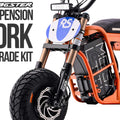 Stomp Ebox Dragster RS Suspension Upgrade Kit components displayed on a white background, including shock absorbers, mounting hardware, and springs.