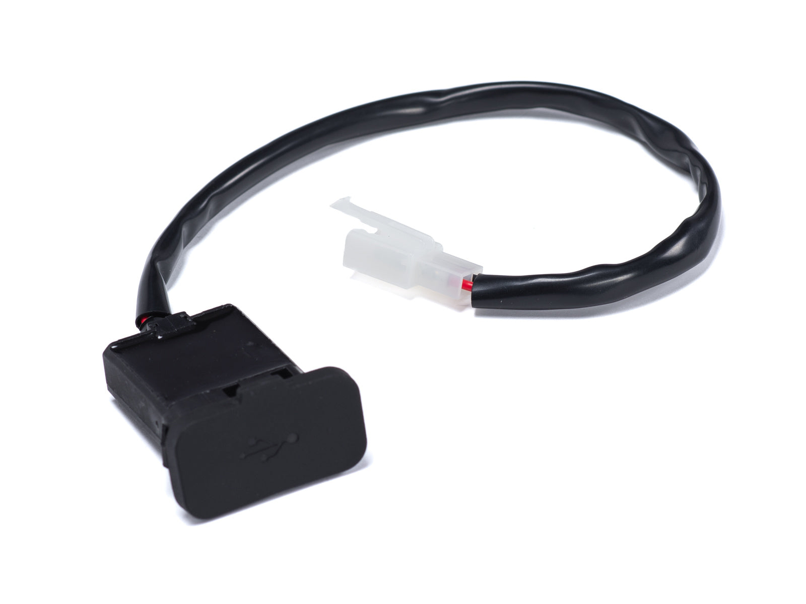 Close-up view of the Stomp Ebox Dragster USB charger port, showing the charging socket and protective cover on the electric bike frame.