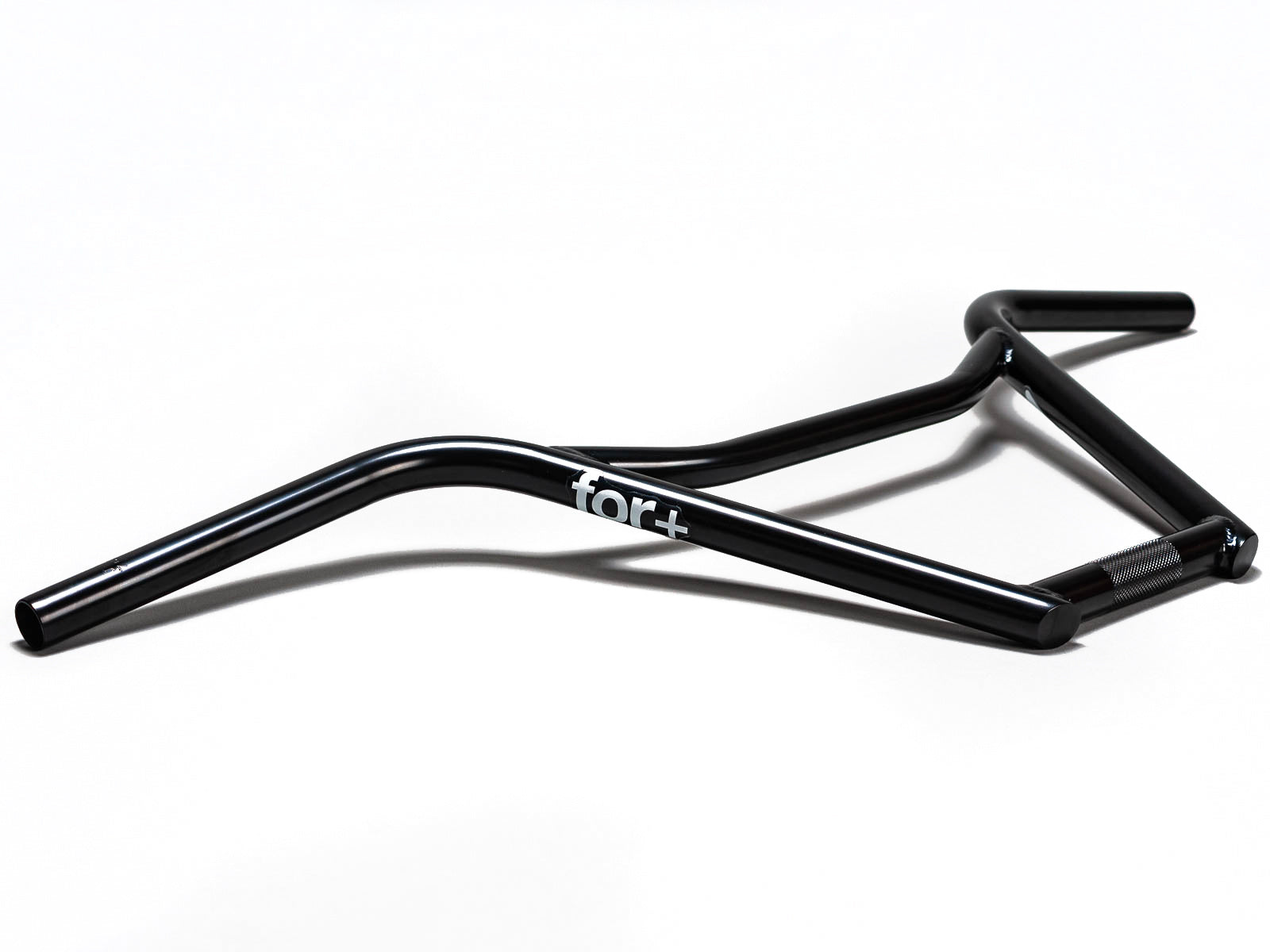 Stomp Ebox For+ Bars, black rectangular energy bars in branded packaging, displayed on a white background.