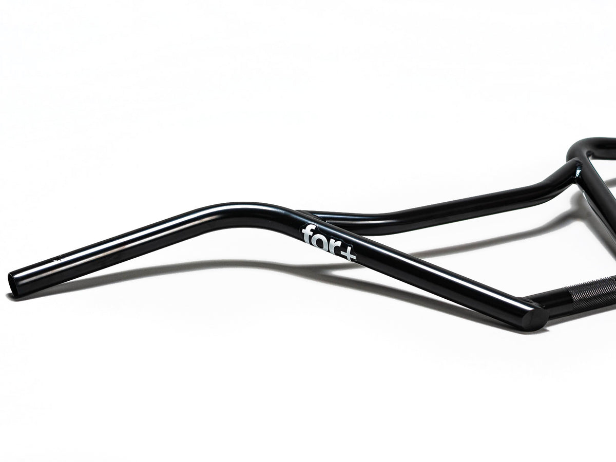 Stomp Ebox For+ Bars, black rectangular electric bike battery with mounting rails and connection ports, displayed on a white background.