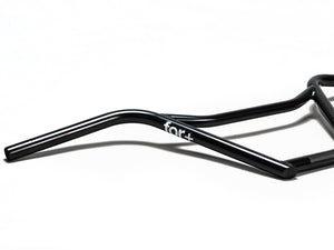 Stomp Ebox For+ Bars, black rectangular electric bike battery with mounting rails and connection ports, displayed on a white background.