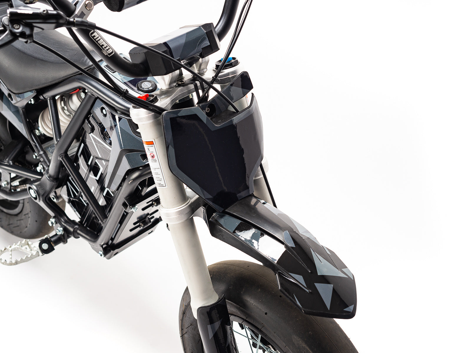 Stomp Ebox Megalith Graphics Kit displayed on a white background, showing detailed black and white graphic decals designed for motocross bikes, including number plates, shrouds, and fenders.