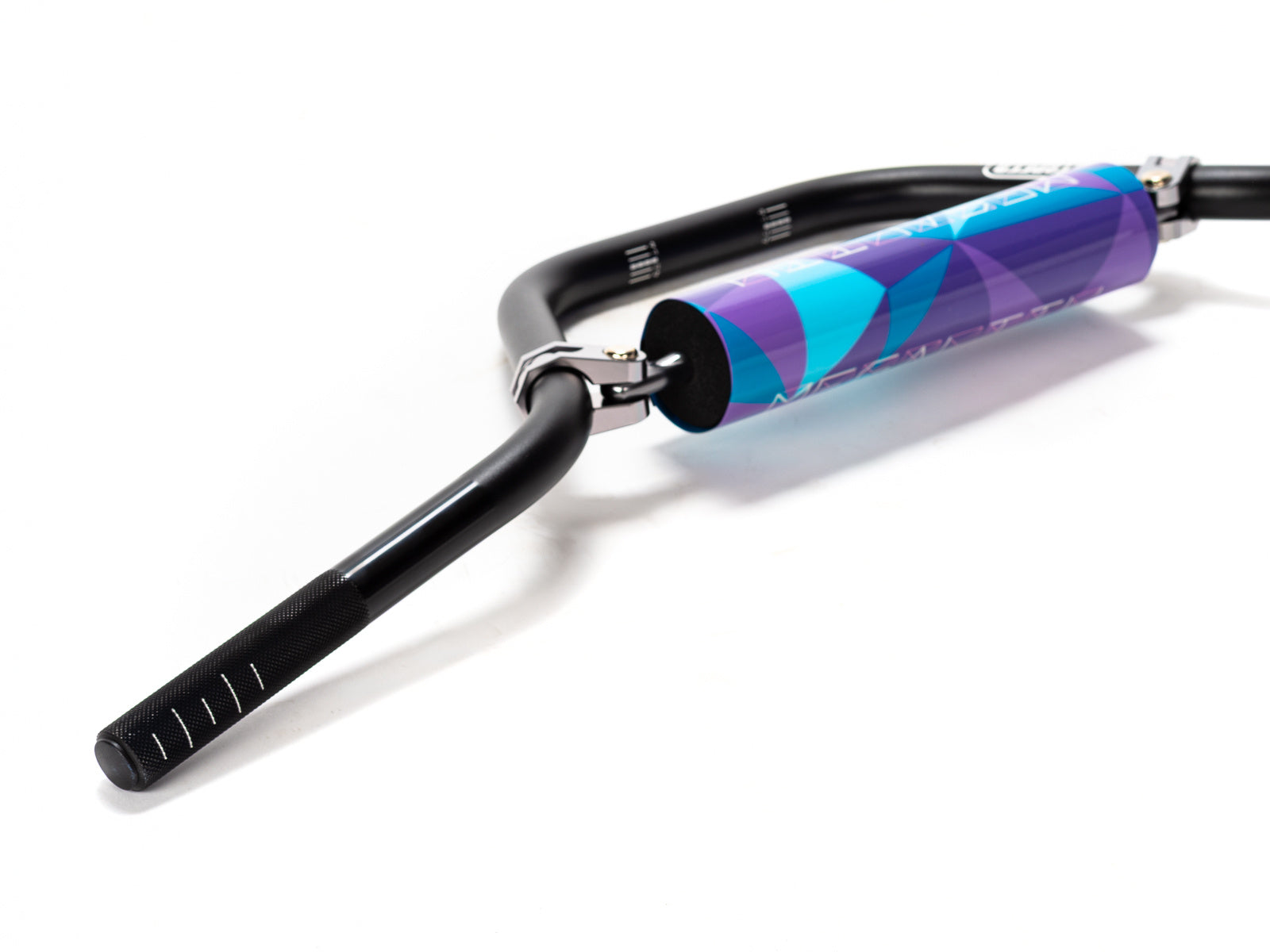 Stomp Ebox Megalith handlebar in purple and blue, close-up view showing grip texture and color gradient