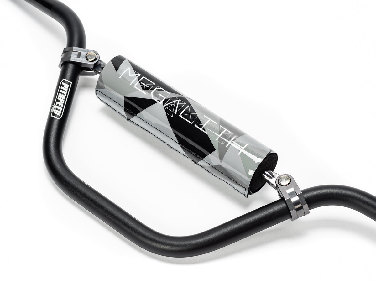 Stomp Ebox Megalith Pitspeed 7075 handlebar, black aluminum, shown from a side angle against a white background.