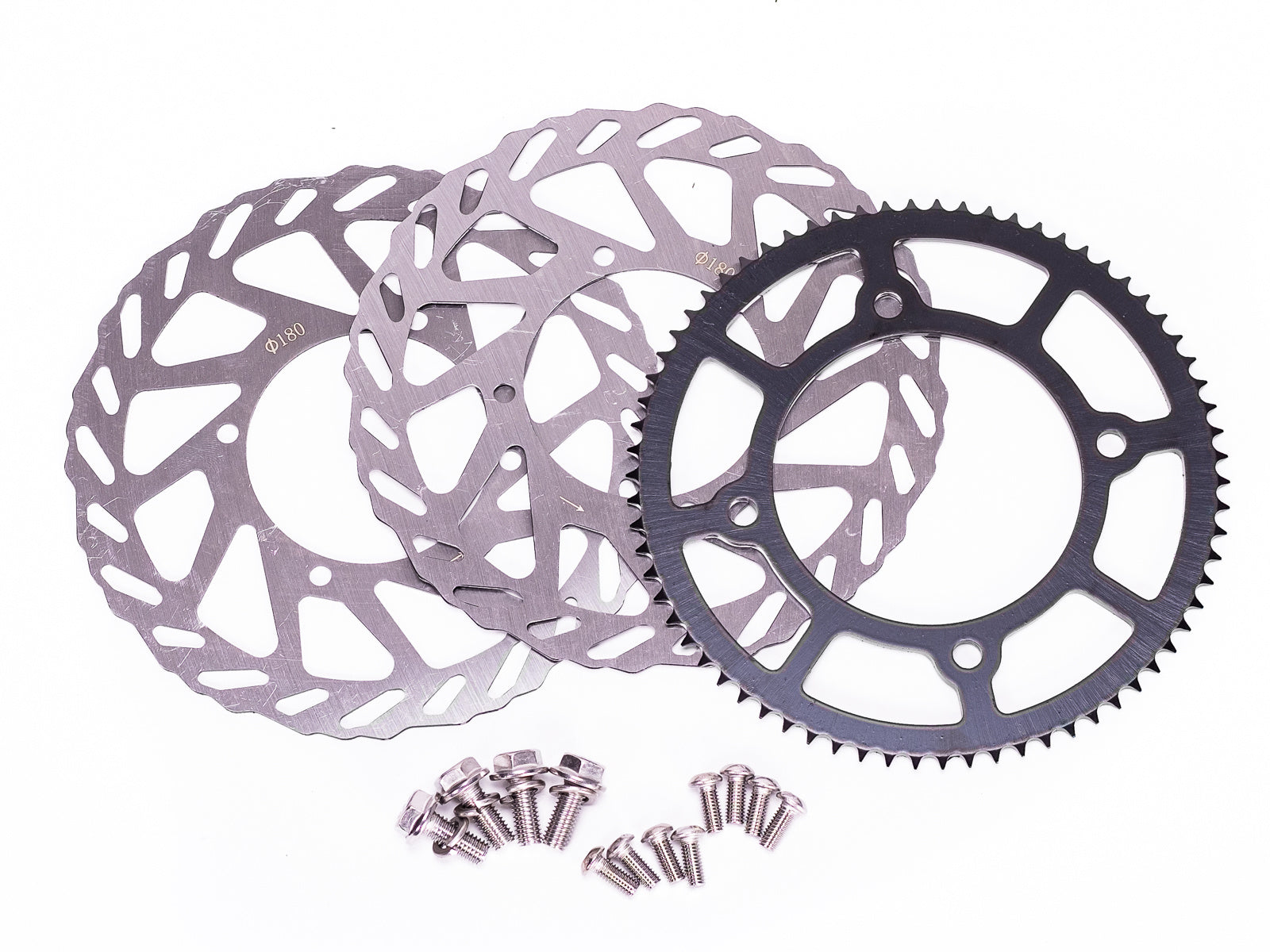 Stomp Ebox Supermoto Wheel Set 12-12, close-up view showing black alloy rims with silver spokes and knobby tires, displayed against a white background.