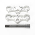 Stomp Ebox triple clamps with steerer, front view showing black anodized finish and precision-machined aluminum construction.