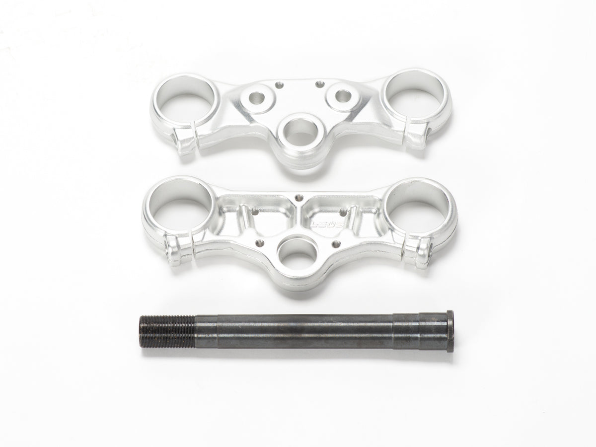 Stomp Ebox triple clamps with steerer, front view showing black anodized finish and precision-machined aluminum construction.