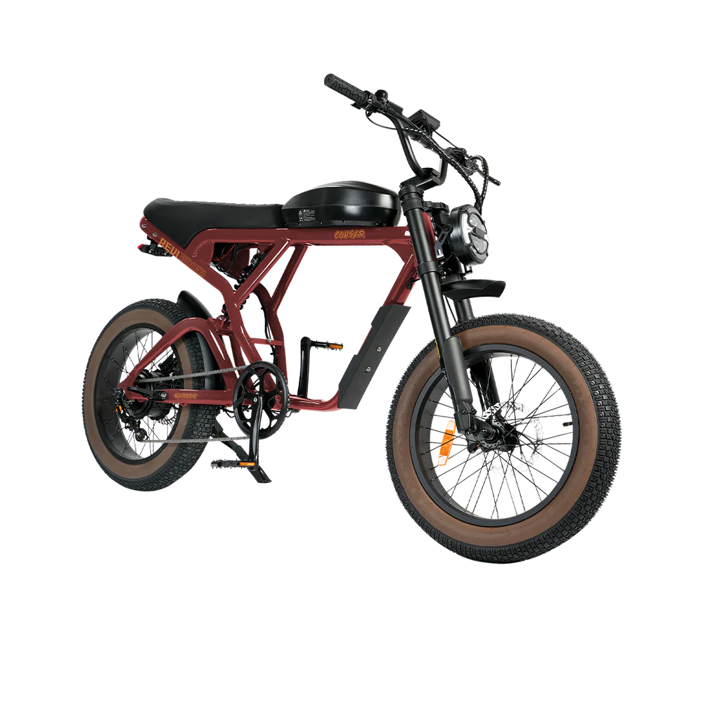 Red eBike Revi Cougar electric bicycle side view with black accents and thick tires