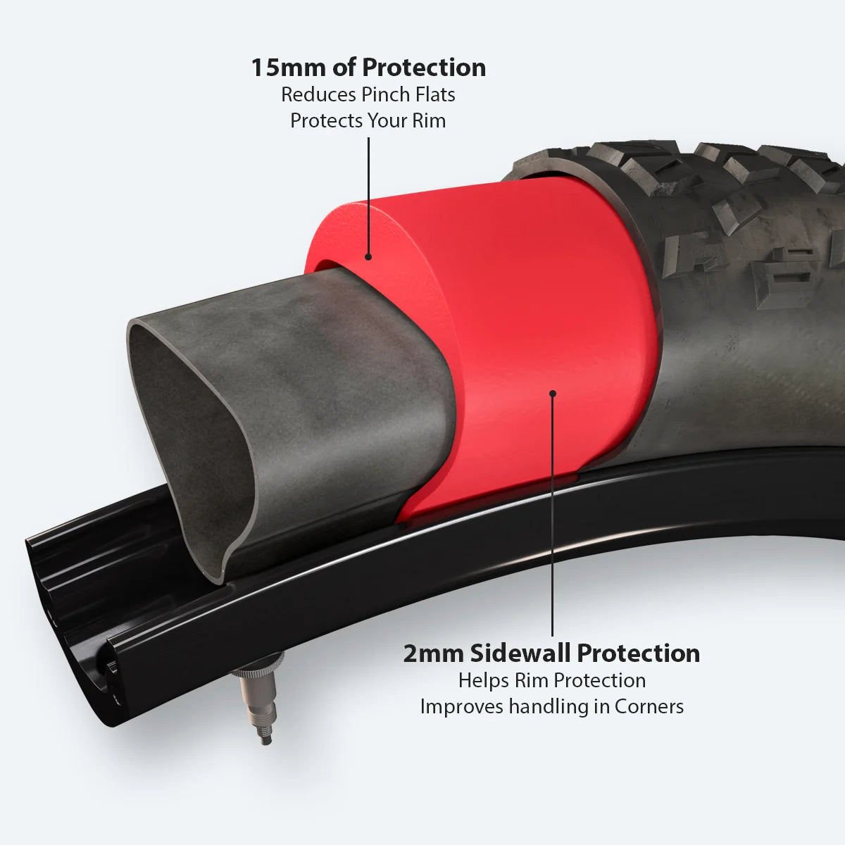 Red Tannus Armour tire liner displayed next to a bicycle tire and inner tube on a white background.