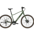 Velotric Tempo High Step eBike in Forest Evergreen color, side view, displayed outdoors