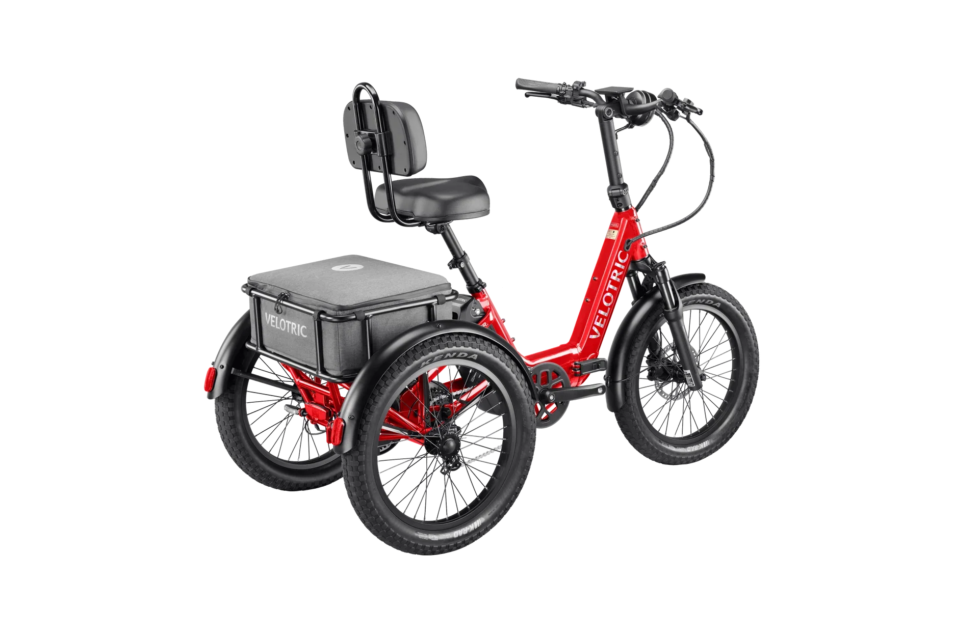A Velotric Triker eTrike in a side view, showcasing its three-wheel design, step-through frame, rear cargo basket, and upright handlebars, set against a plain background.