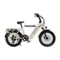 Cream-colored eBike Revi Runabout.2 packaged inside its shipping box