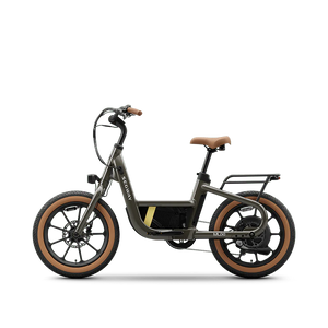 Olive green Segway Muxi eBike, side view, parked on a paved surface with a blurred outdoor background.