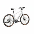 Side view of the Velotric Tempo eBike in a studio setting, showcasing its step-through frame, integrated battery, and upright handlebars.