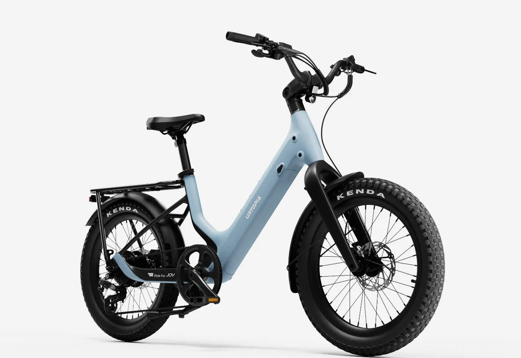 Side view of the Urtopia Carbon Joy Ultra eBike in Glacier Blue, showcasing its sleek carbon frame, integrated battery, and modern design against a white background.