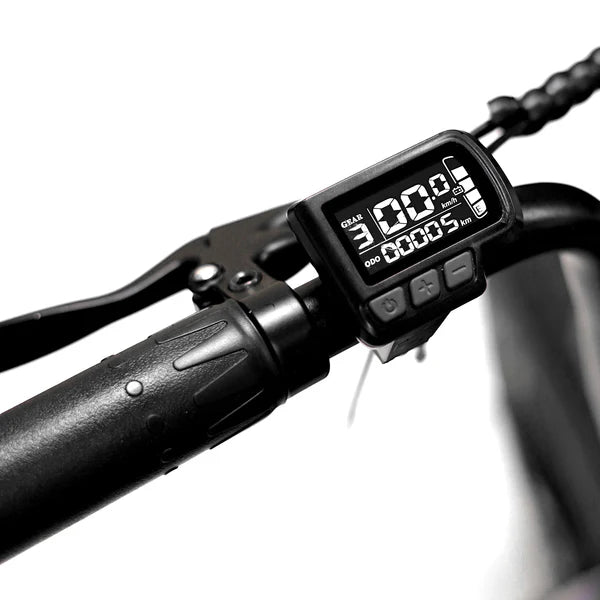 Chrome eBike Strike Big Boy electric bicycle, side view, showcasing large tires and sleek metallic frame