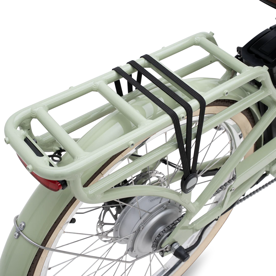 Side view of the Murf Gigi 2.0 eBike in sand color, showing its step-through frame, wide tires, and rear cargo rack against a plain background.