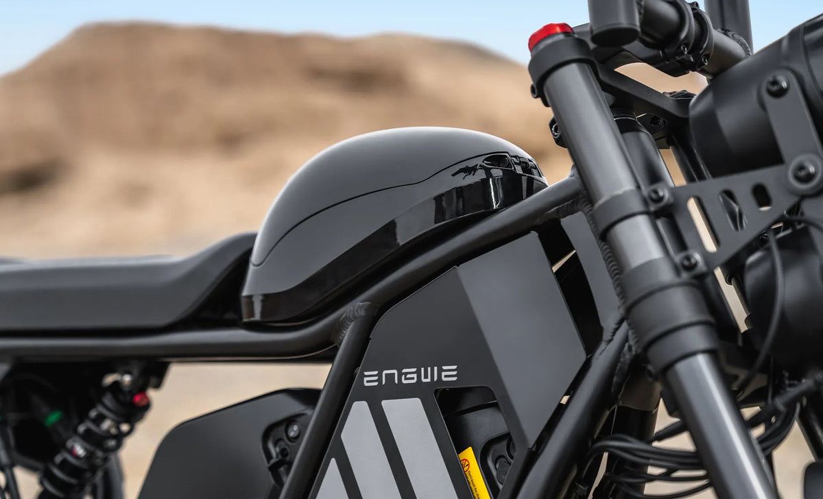 Engwe M20 3.0 electric bike in matte black, shown from a side angle with thick tires, dual headlights, and a sturdy frame, set against a plain white background.