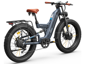 Side view of the Freesky Warrior Pro M-530 electric mountain bike in black and blue, showing its fat tires, front suspension fork, and battery integrated into the frame.