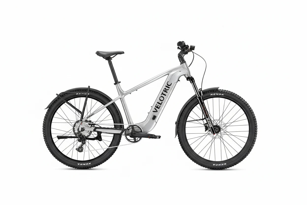 A black Velotric Summit 2 eBike shown from the side, featuring a sturdy frame, front suspension fork, wide tires, and integrated battery.